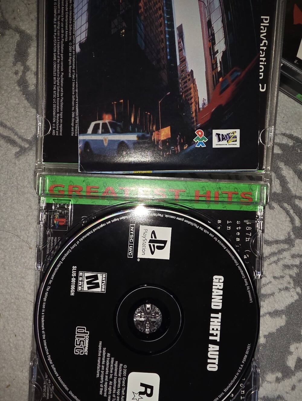 Sony PlayStation Black Grand Theft Auto Disc with Green 'Greatest Hits' Trim